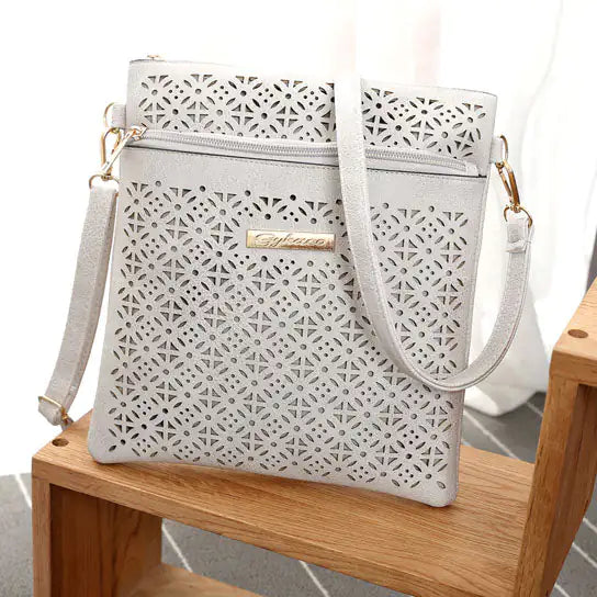 Handbag With Cutout Flower Design